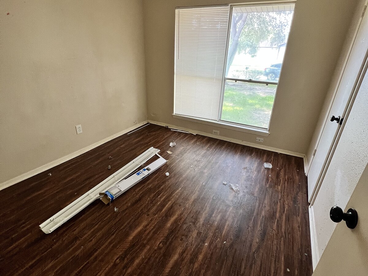 Empty room with clean hardwood floors